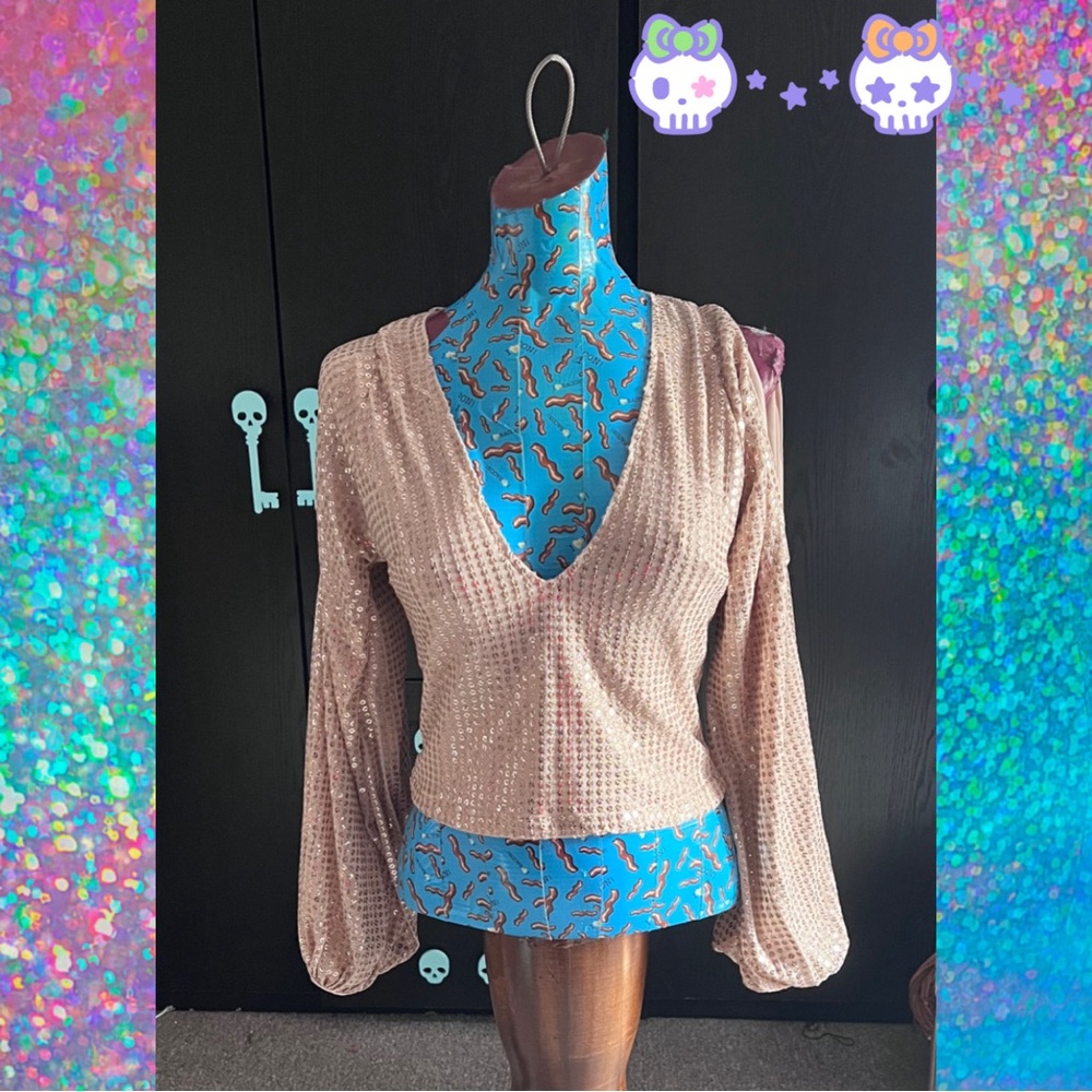 Cold shoulder sequin top